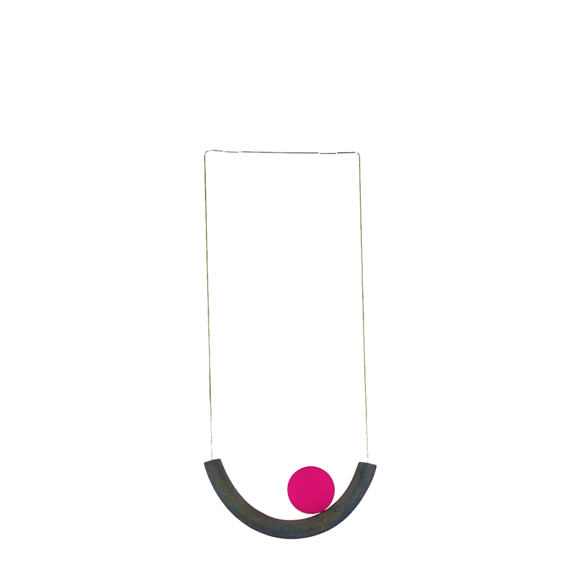 Handmade wooden necklace featuring a curved wooden tube pendant with a round pink acrylic accent. A unique, eco-friendly, artisan-crafted jewelry piece with a modern touch.