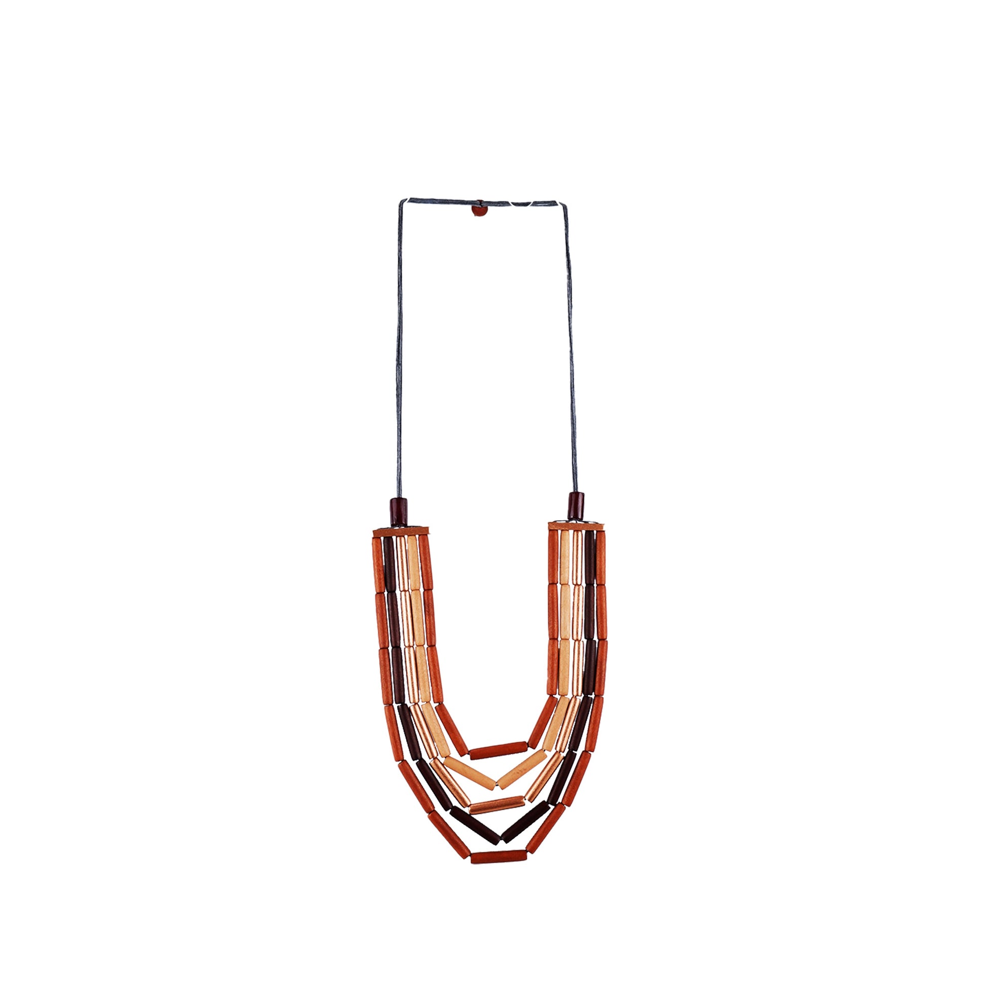 Handmade wooden necklace with layered wood tube components and multiple rows in orange. A unique, eco-friendly artisan-crafted statement jewelry piece.