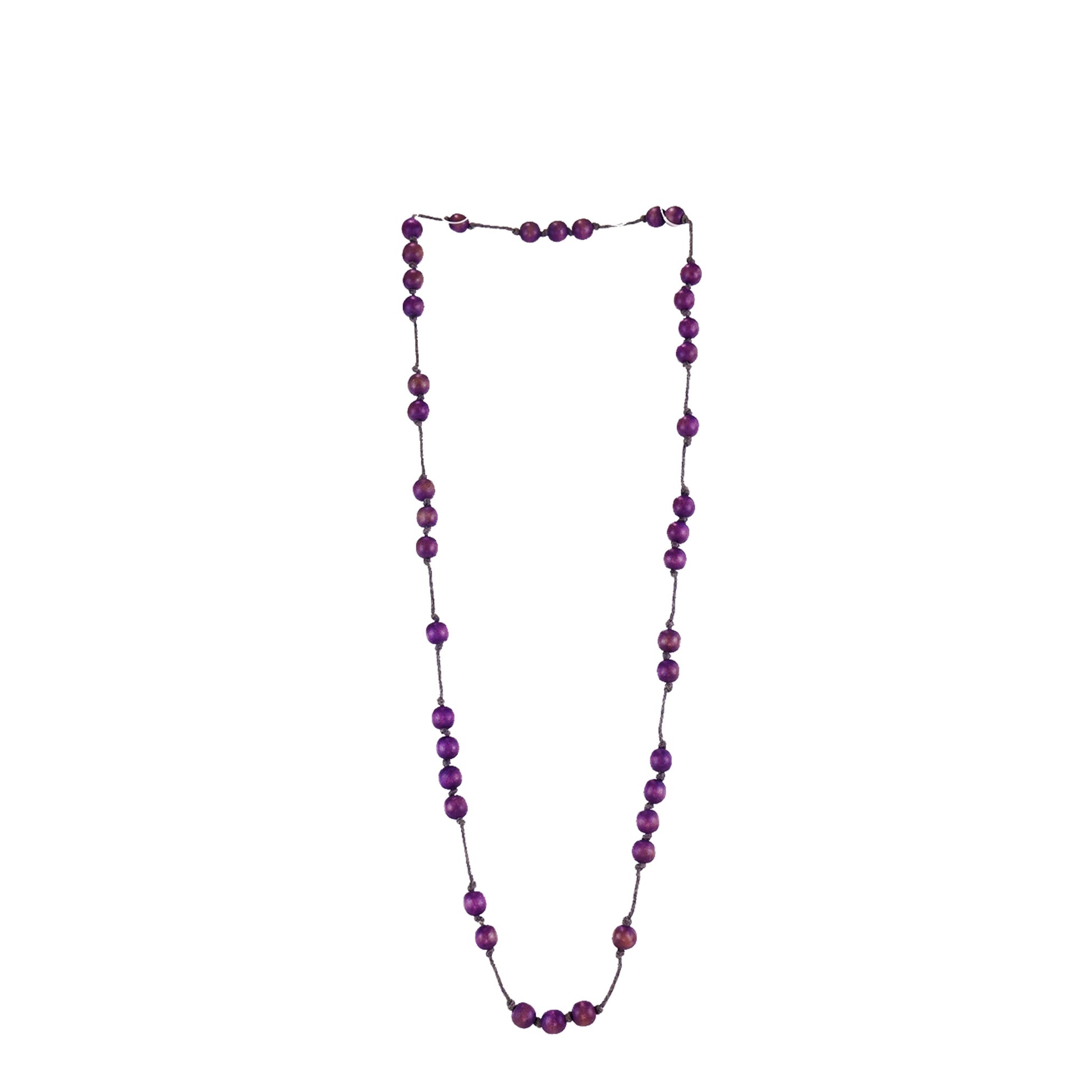 Handmade purple wooden necklace featuring round beads strung along a fine cord. A unique, eco-friendly, artisan-crafted minimalist jewelry piece.